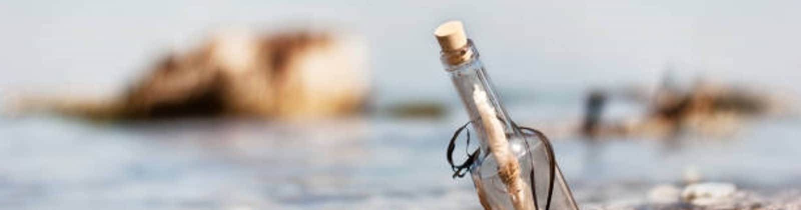 bottle on beach image