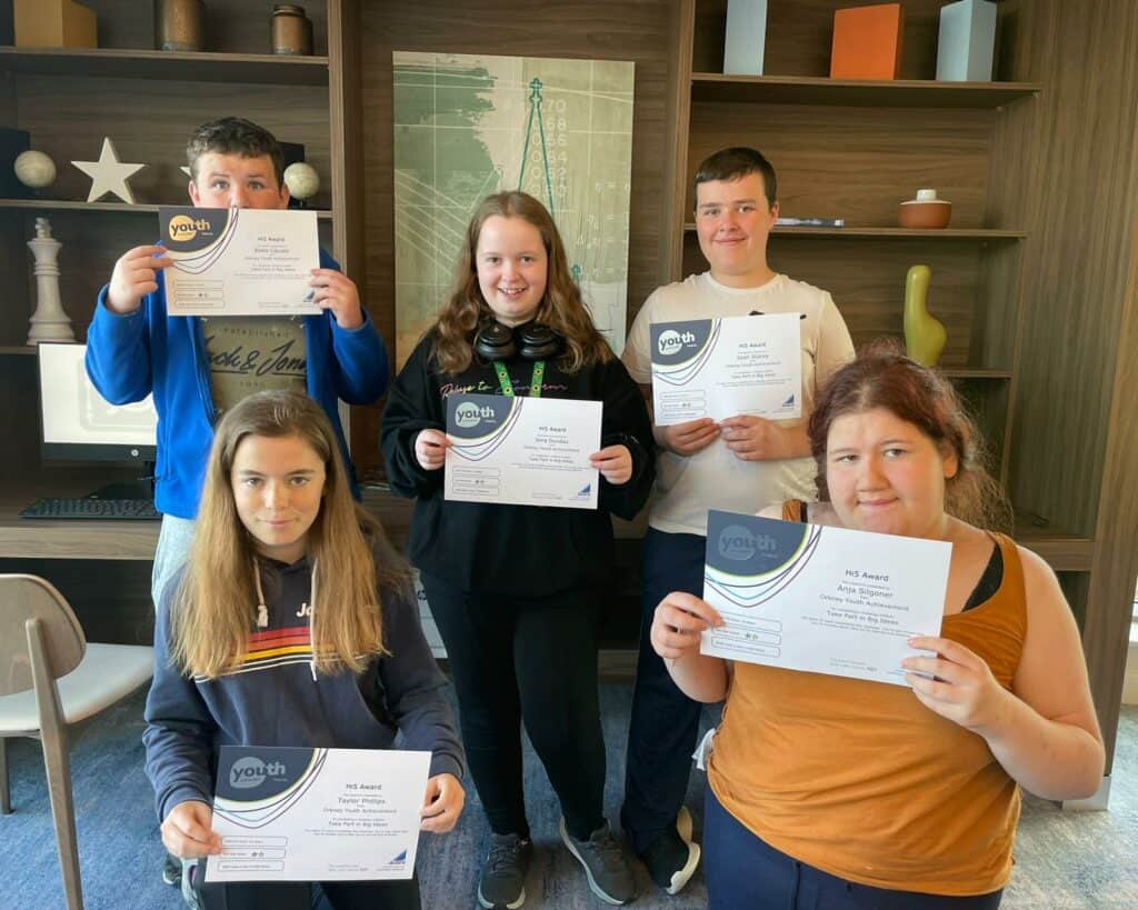 5 young islanders from Orkney holding their award certificates